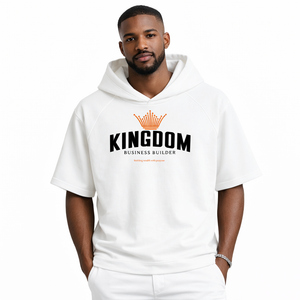 Man wearing a white hoodie with 'Kingdom Business Builder' logo on a white background